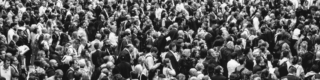 Crowd of people looking one way at an event